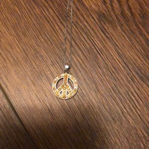 Yellow stone peace sign necklace In Sterling silver